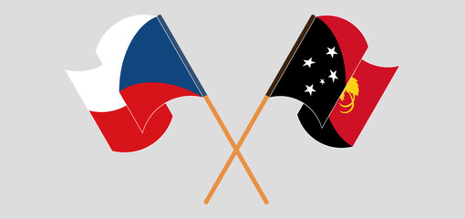 Crossed and waving flags of Czech Republic and Papua New Guinea