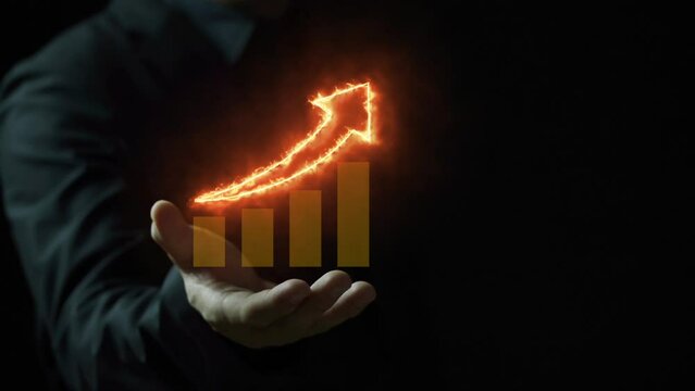 Businessman shows virtual graph with rising up fire arrow, growth of business, investment, stock market, economic, technology, finance and innovation. Business development to success and plan concept.