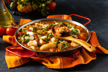 Traditional Portuguese fish stew. Cod stew.