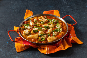 Traditional Portuguese fish stew. Cod stew.