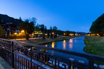 Promenade in Szczawnica over the Grajcarek stream. Night scenery. © gkrphoto