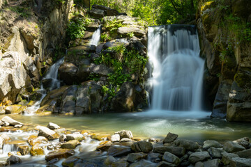 Beautiful view of the Zaskalnik waterfall in the Pieniny Mountains. Szczawnica. Long exposure.