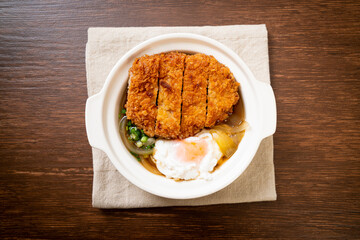 Japanese fried pork cutlet (katsudon) with onion soup and egg