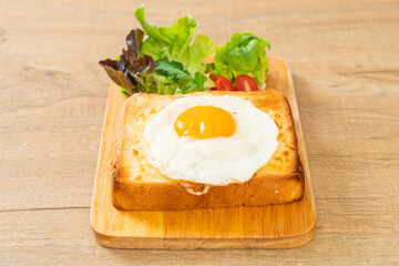 bread toasted with cheese and fried egg