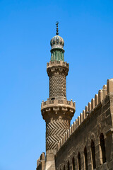 Obraz premium Minaret on the wall with green accent near the Great Mosque of Muhammad Ali Pasha, Cairo, Egypt