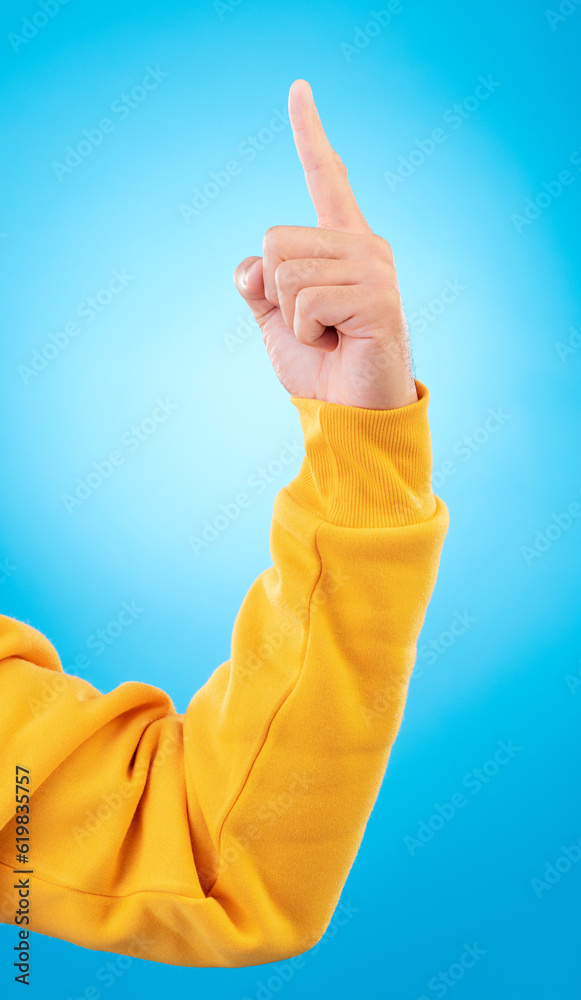 Poster Man, hands and pointing up finger for idea, solution or remember in memory against a blue studio background. Hand of male person in choice, decision or advertising plan guide, offer or opportunity