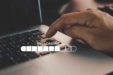Businessman using smartphone and laptop uploading to cloud computing to download and loading data...