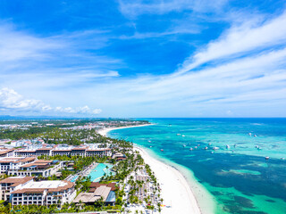 Aerial view of the Punta Cana beach with white sand and turquoise water of the Caribbean Sea. Top...