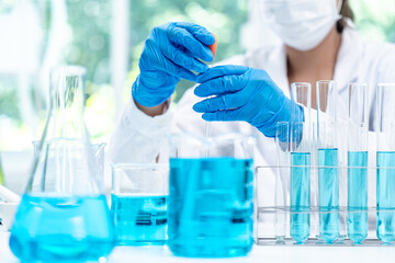 Chemical laboratory research with scientific tube and flask glassware equipment, science medicine liquid experiment test on Chemistry, Biotechnology, or Biology for business medicals development