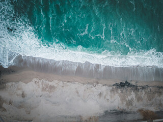 Shore of a beach with white sand and turquoise sea. aerial view. Punta hermosa beach, lima peru