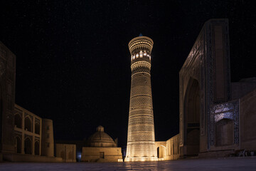 Minaret and the Illusion of starry square, in Bukhara in Uzbekistan 