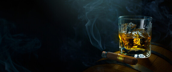 A whiskey glass, cigar and old oak barrel; luxurious men's club banner background with copy space