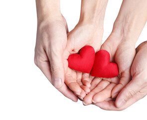 Obraz premium Male and female hand holding red love hearts, cut out