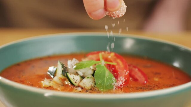 Tomato gazpacho Spanish cold soup with pepper and garlic, Spanish traditional cuisine, chef cooking dinner.