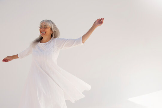 Holistic Senior Woman. Photography on a white background. 