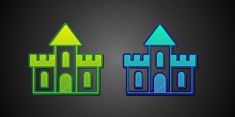 Green and blue Sand castle icon isolated on black background. Vector