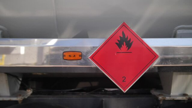Flammable liquid symbol on the chemical tank, Flammable and dangerous chemicals in industry. Combustible chemical warning sign.