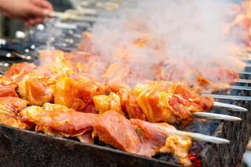 Traditional georgian mtsvadi, grill on the coals with smoke. Shashlik