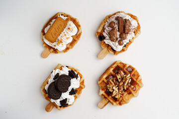 group of 4 decorated waffles-top view