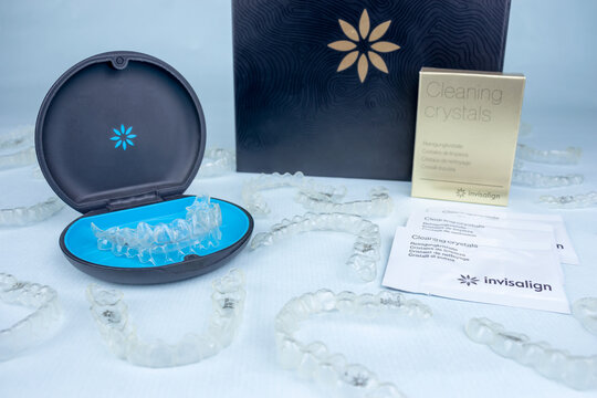 Clonmel, Ireland - 14 June 2023: Invisalign original package with transparent orthodontic retainers, box and cleaning crystals