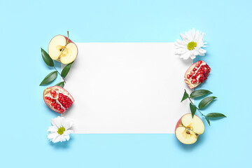 Naklejka na ściany i meble Composition with blank paper sheet, fruits and flowers on color background. Rosh hashanah (Jewish New Year) celebration