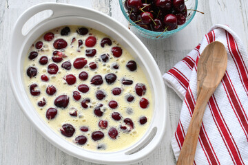 Making French Dessert Cherry Clafoutis or Clafouti - unbaked
