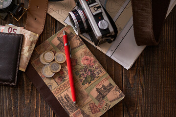 Still life concept travel, adventure. Preparation for a trip, travel expenses, must-haves for an...