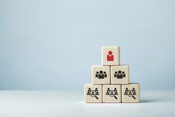 Assembled wooden cubes on the theme of business leadership