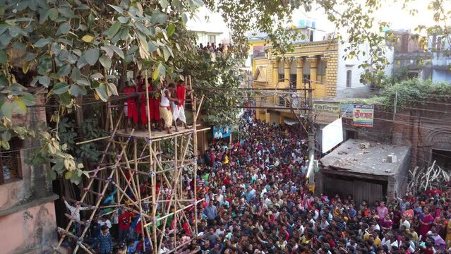 West Bengal, India - 13 April 2023: Aerial view of people celebrating Charak Puja, an Hindu festival in Beldanga, West Bengal, India