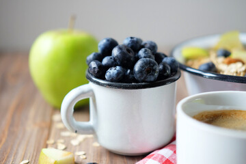 Oatmeal porridge, boiled egg, milk, fresh berries and coffee. A great start to a new day.