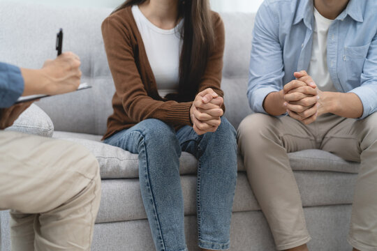 Couple Relationship Therapy With A Counselor. Close Up Hands Of The Woman Client During A Conversation With Psychologist To Find Problems And Solution.