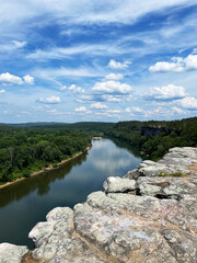 Obraz premium City Rock Bluff in Calico Rock Arkansas overlooking the White River in summer with a blue sky and clouds vertical