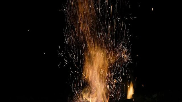 Flames Of Fire And Sparks On Black Background. Magic Fier. Bonfire Flaming In The Night. Burning Sparks Flying. Fiery Orange Glowing Flying Away Particles On Black Background.