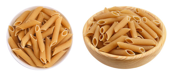 Wolegrain penne pasta from durum wheat in bowl isolated on white background with full depth of field. Top view. Flat lay,