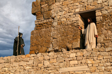 Jesus and Devil on a fortress tower of Jerusalem. Biblical concept. - obrazy, fototapety, plakaty