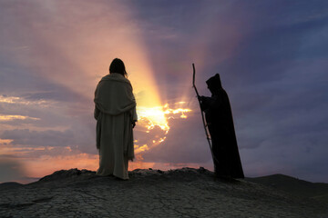 Jesus and Satan on a hill at spectacular sunset in the Wilderness of Judea.