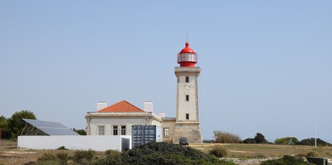 Fototapeta na wymiar Phare d' Alfanzina à Carvoeiroo, Algarve-Portugal