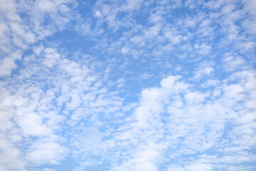 Naklejka na ściany i meble View of beautiful blue sky with white clouds.