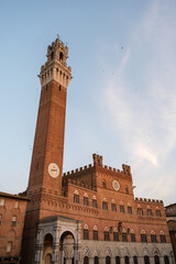 Fototapeta premium The Palazzo Pubblico in Piazza del Campo, the central square of Siena, Tuscany, Italy.