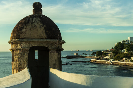 fortress sentries of Farol da Barra with the view of fortress of Santa Maria and baia de todos os santos (bay of all saints). Historical place from Bahia