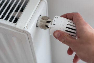 turning down thermostat on radiator to save energy due to heating cost price hike