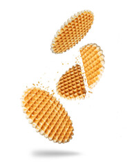 Delicious round waffles in the air isolated on white background