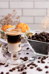 breakfast and snack with tea and coffee with cornstarch and chocolate alfajores with mini donuts and muffins