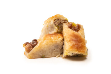 Delicious sweet baklava with walnuts isolated on white background.