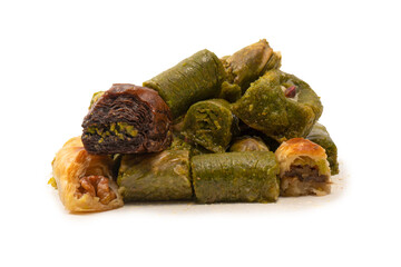Turkish pistachio baklava isolated on a white background. A variety of turkish sweet baklava.