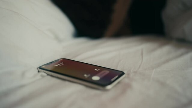 Husband calling on phone while wife is in bed with somebody else, infidelity