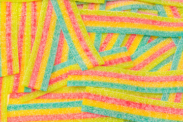 Colorful juicy gummy candies background. Top view. J