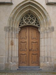 Fototapeta na wymiar Wooden door to Emmaus Monastery, Prague Czec