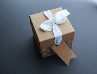 Gift box with ribbon and tag