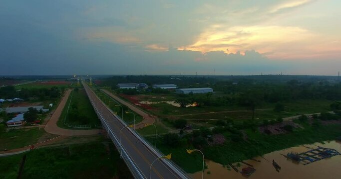 .aerial view beautiful Thai-Laos Friendship Bridge 3 across Kong river at sunrise..A beautiful bridge that connects Thailand on the Nakhon Phanom Province side and Laos Khammouane..